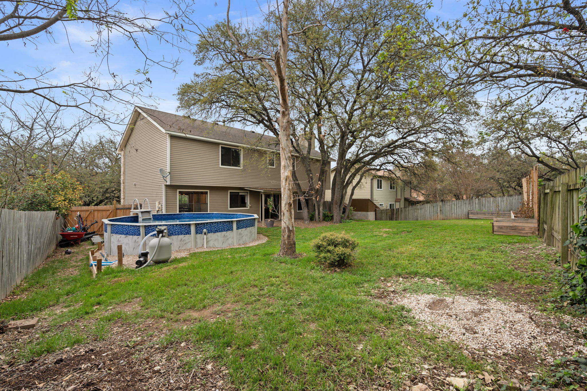 11942 Bittern Hollow Austin, TX 78758 - Photo 21 of 29 a view of a house with a yard and sitting area