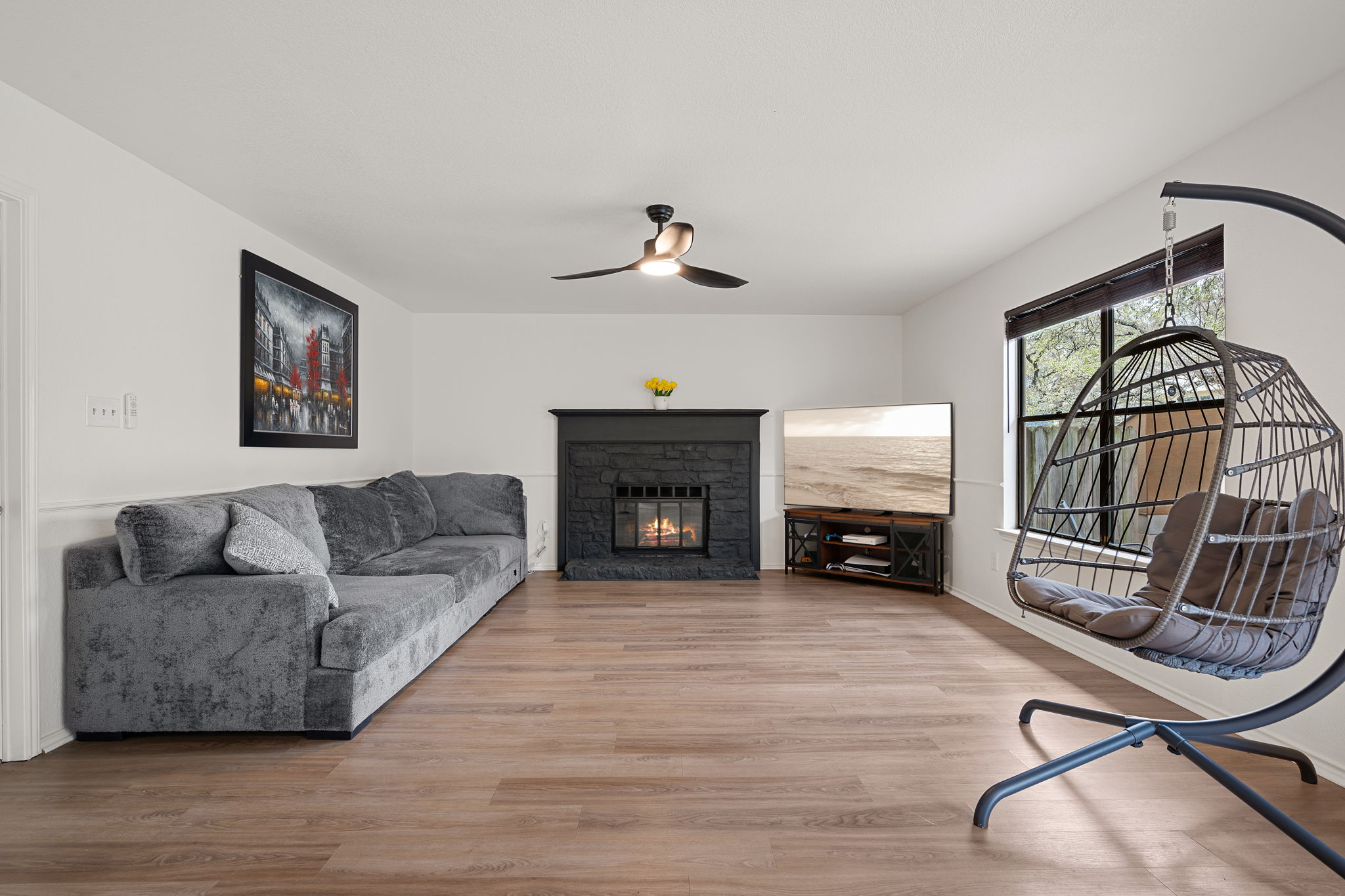 11942 Bittern Hollow Austin, TX 78758 - Photo 5 of 29 a living room with furniture and a fireplace