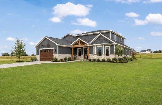 2463 County Road Bonham, TX 75418 - Photo 1 of 29 a front view of a house with a garden
