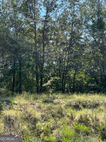 a view of outdoor space with a lake view