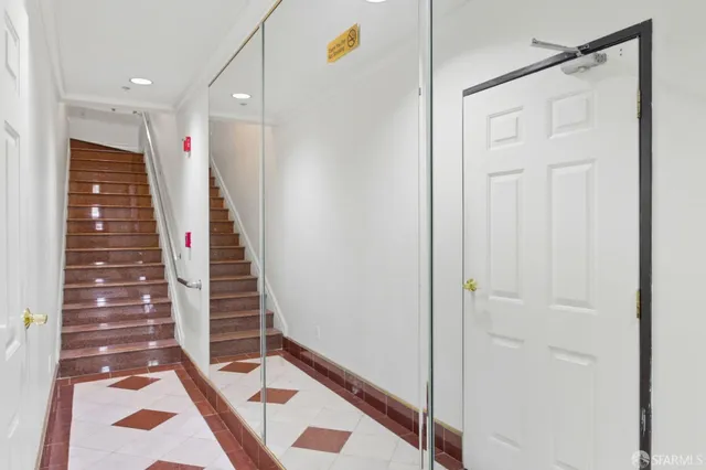 a view of entryway with wooden floor