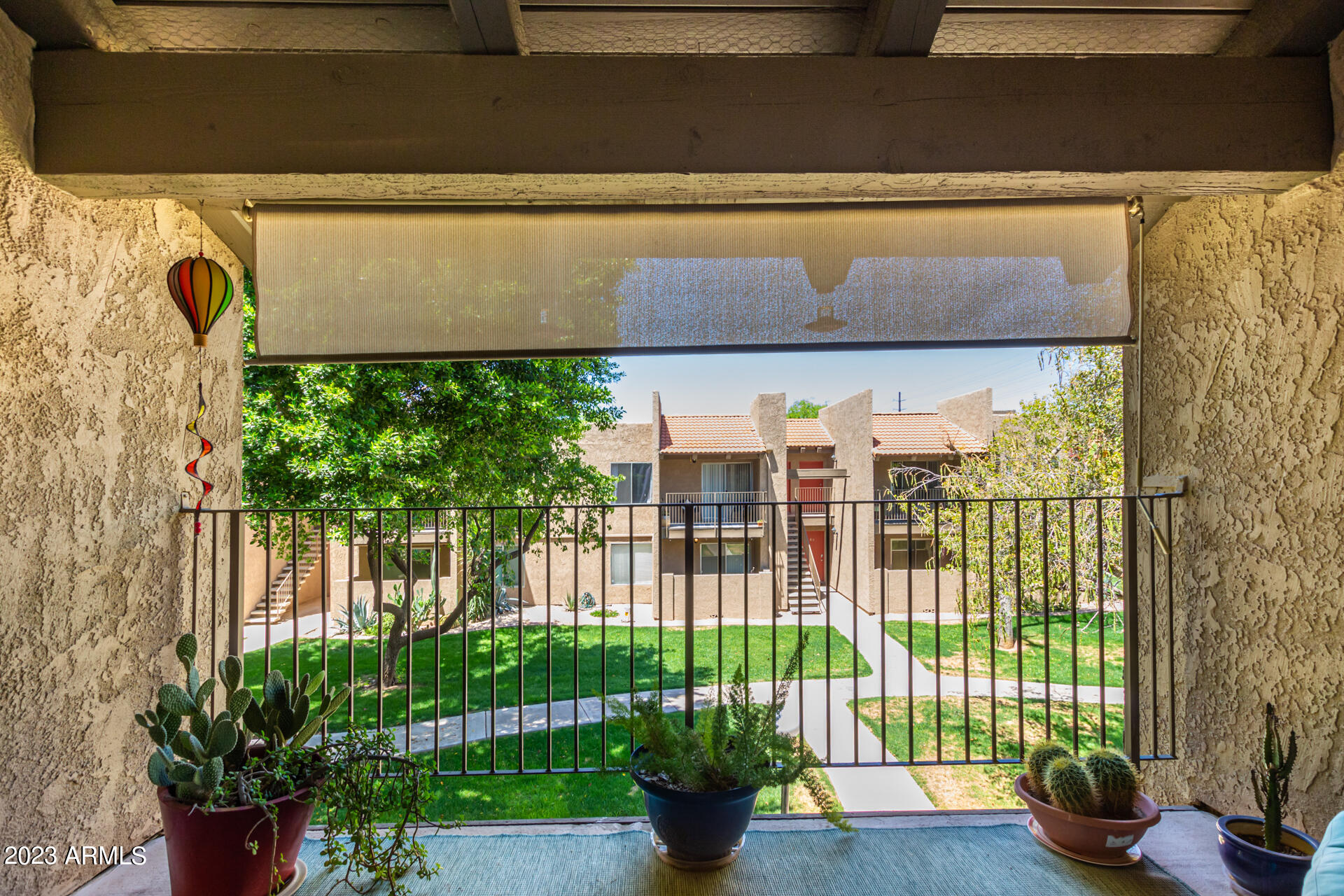 5525 East Thomas Road, Unit E8 Phoenix, AZ 85018 - Photo 26 of 44 Balcony (with sunshade partially down)