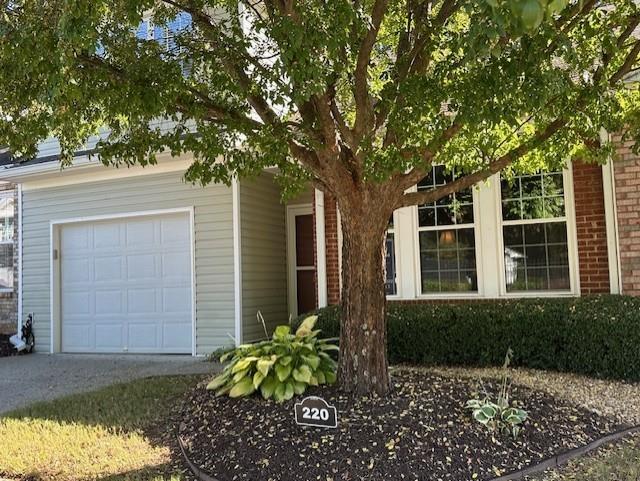 220 Riverstone Place Canton, GA 30114 - Photo 1 of 1 front view of a house with a garden