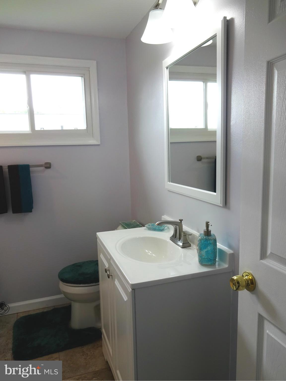 3004 Baybriar Road Baltimore, MD 21222 - Photo 14 of 24 Updated Full Main Bath