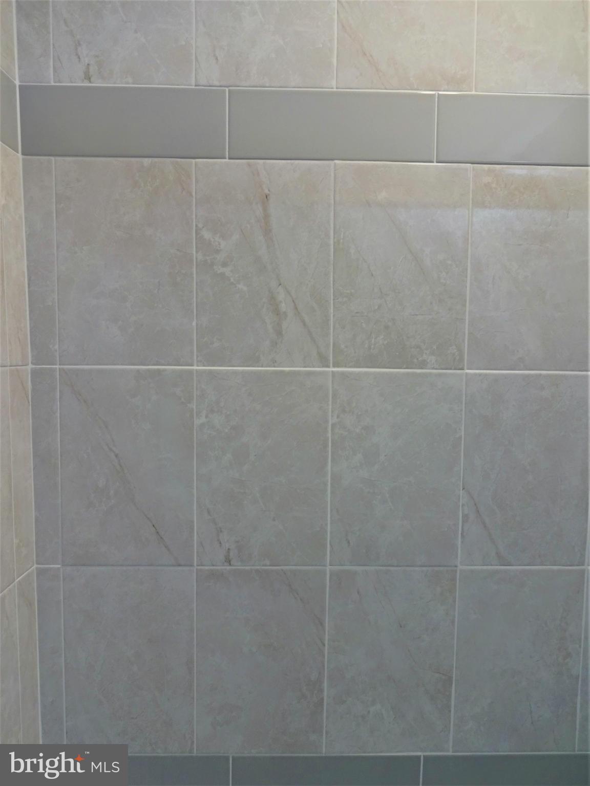 3004 Baybriar Road Baltimore, MD 21222 - Photo 21 of 24 Beautiful Ceramic Tile in the Master Bath