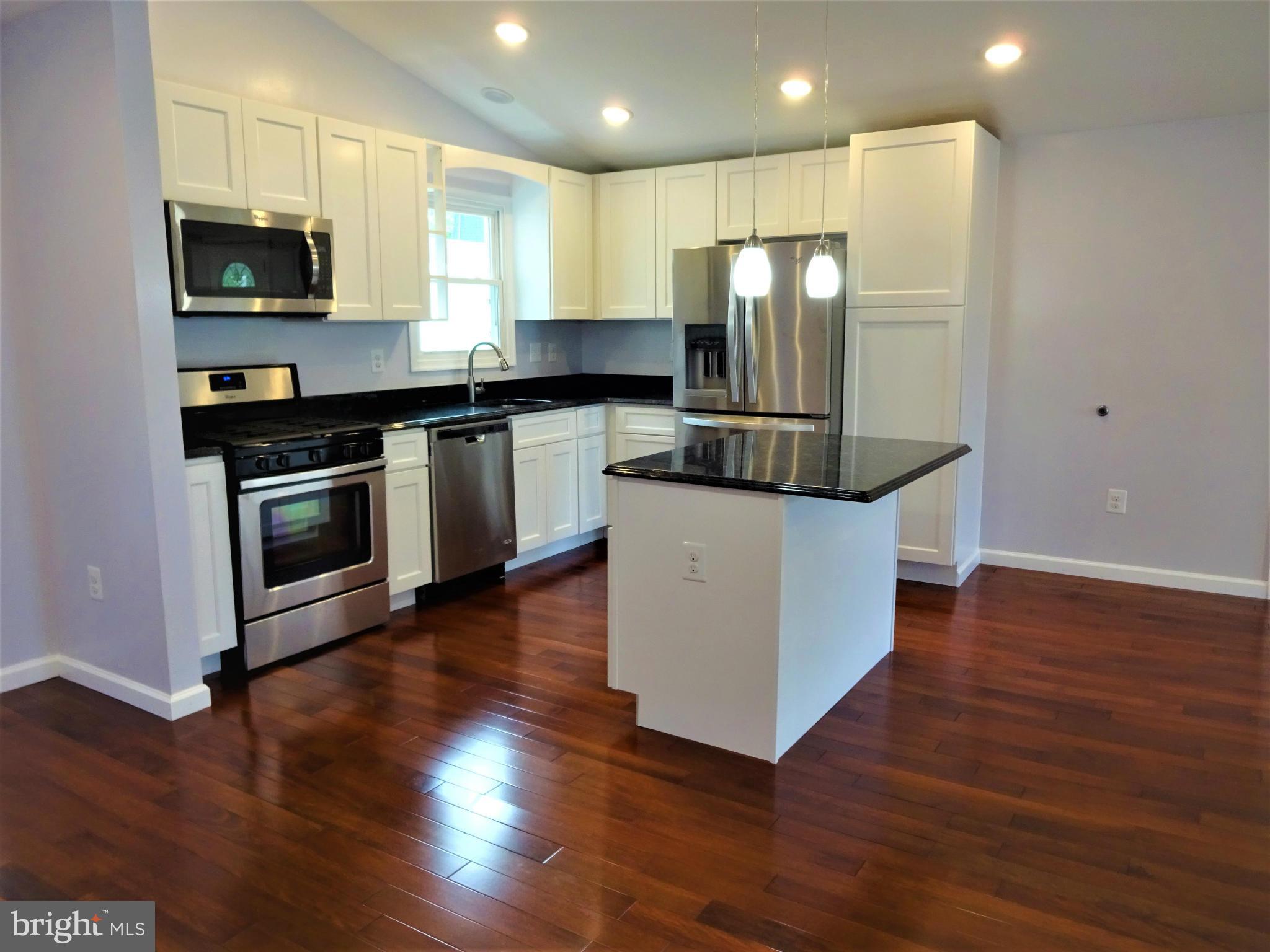 3004 Baybriar Road Baltimore, MD 21222 - Photo 6 of 24 New Cabinets, Granite Counters, Center Island
