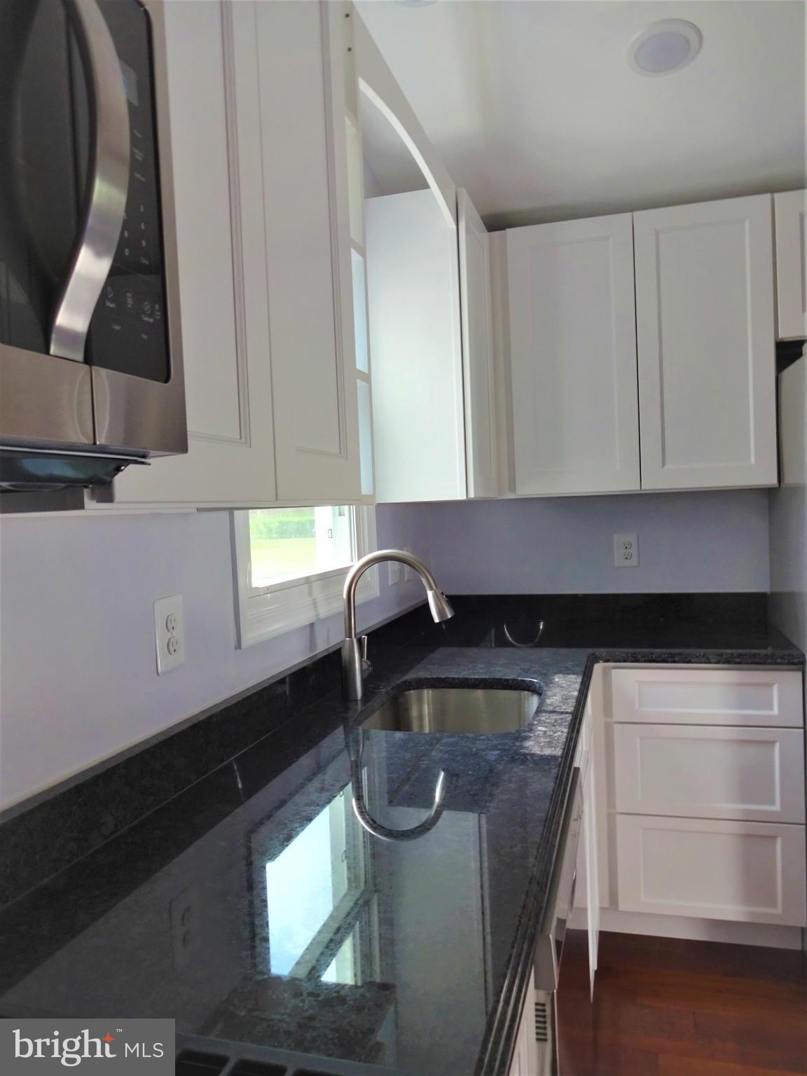 3004 Baybriar Road Baltimore, MD 21222 - Photo 9 of 24 Kitchen Offers Gorgeous Granite Counters