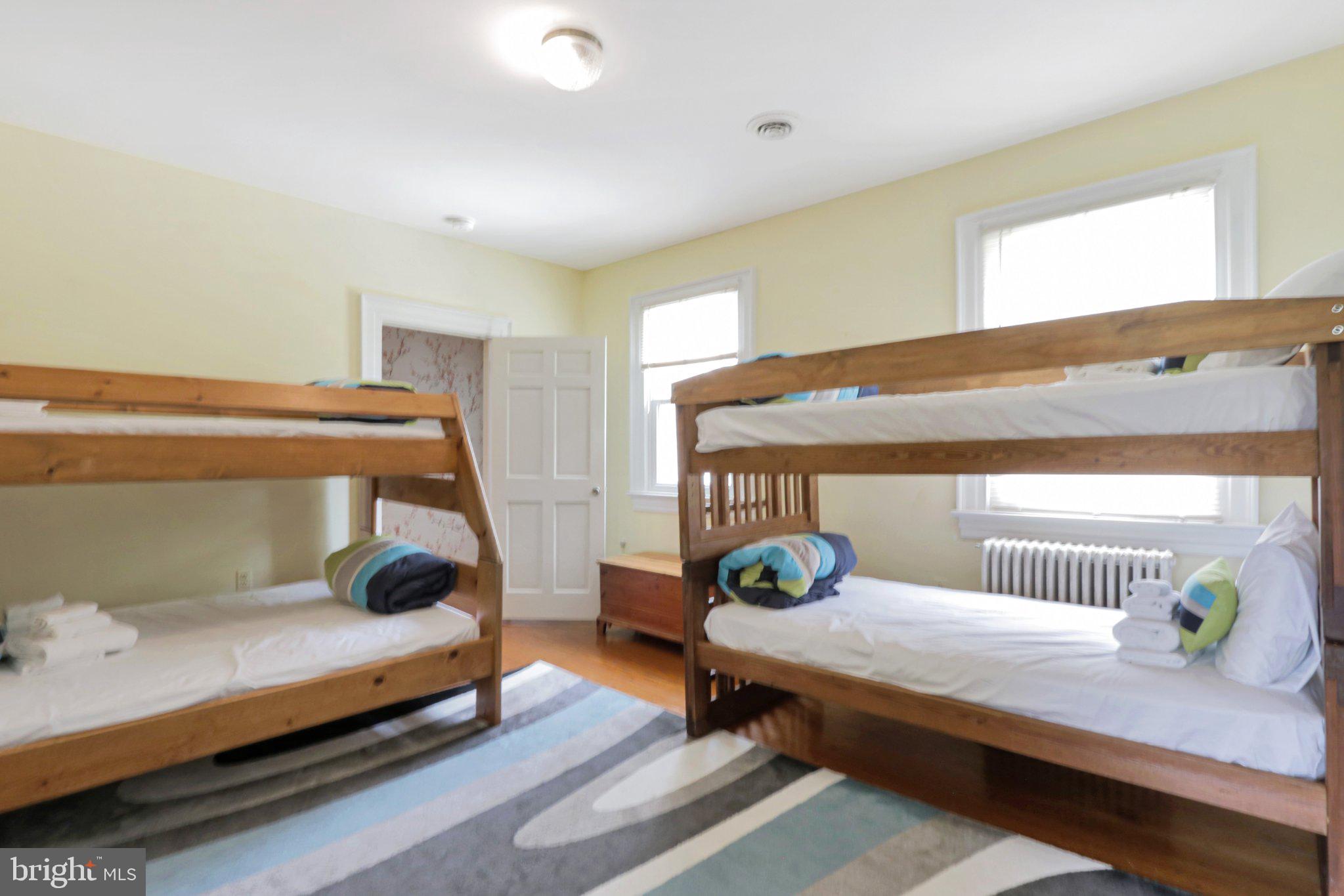 2598 Cherrystone Road Cape Charles, VA 23310 - Photo 38 of 47 Bright and inviting bunk room retreat.