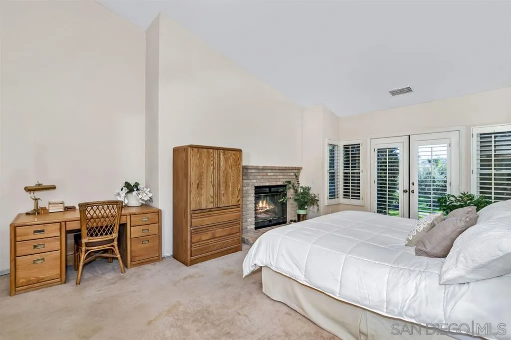 1631 Dewitt Estates Road Alpine, CA 91901 - Photo 21 of 25 a bedroom with a bed and a closet