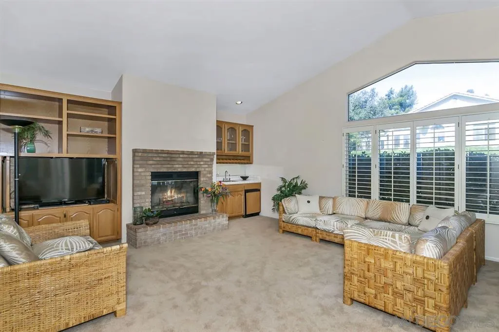1631 Dewitt Estates Road Alpine, CA 91901 - Photo 4 of 25 a living room with furniture and a fireplace