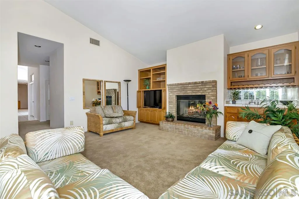 1631 Dewitt Estates Road Alpine, CA 91901 - Photo 6 of 25 a living room with furniture and a fireplace