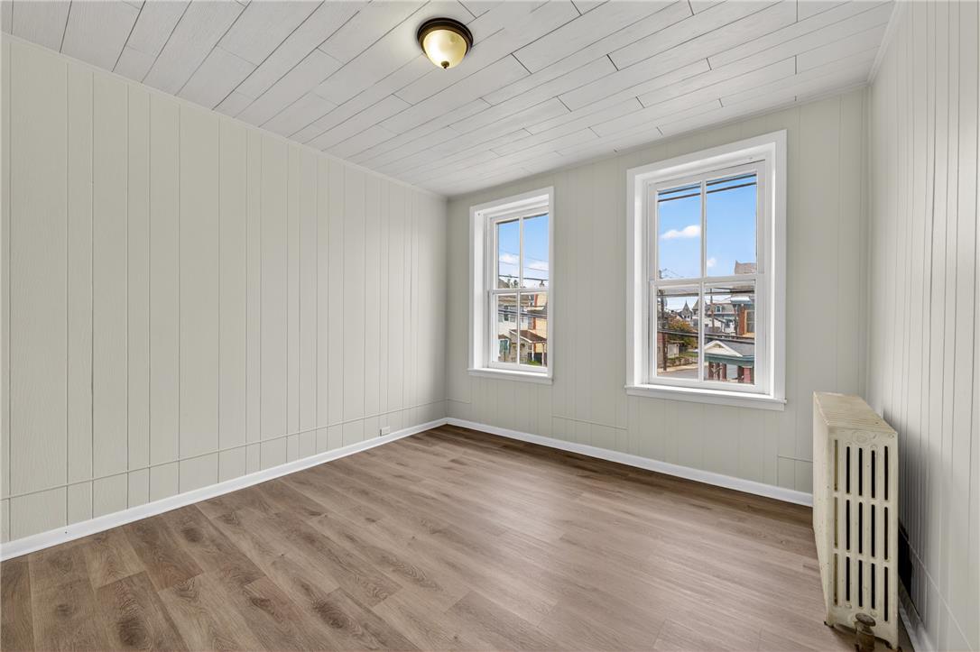 65 2nd Street Slatington, PA 18080 - Photo 29 of 46 This naturally illuminated room features a textured ceiling and sturdy wood-style flooring.