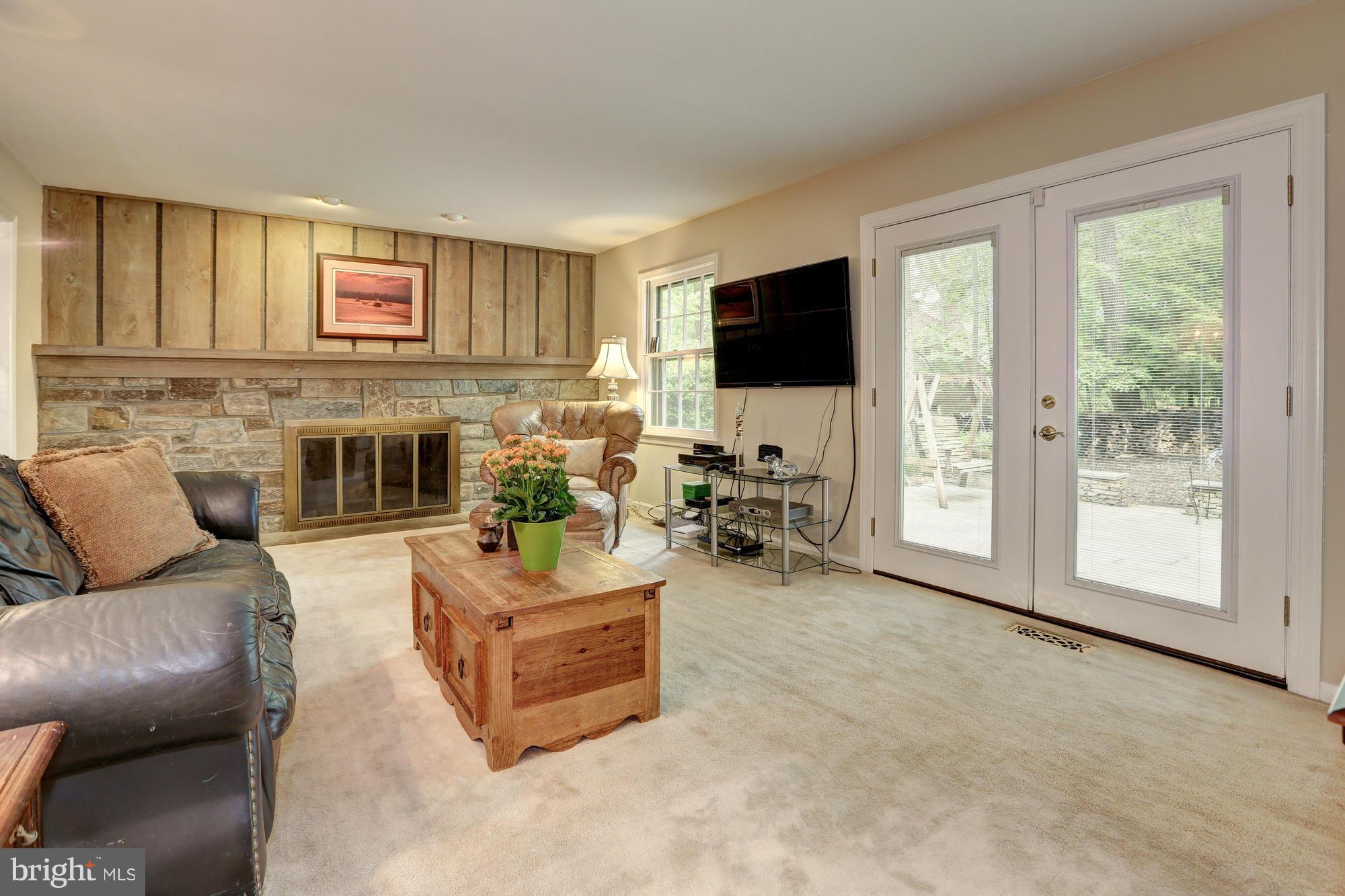 11909 Hunting Ridge Court Potomac, MD 20854 - Photo 14 of 27 Family Room w/ Wood-Burning Fireplace