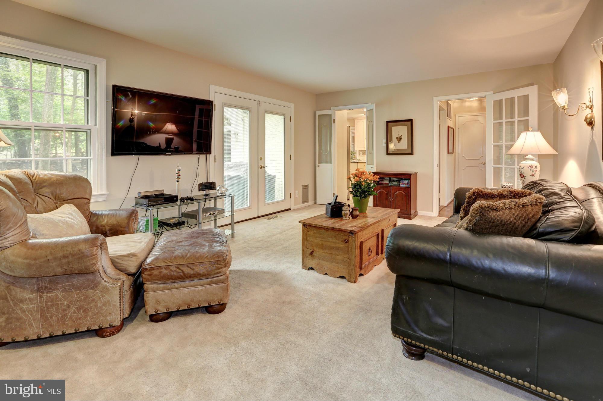 11909 Hunting Ridge Court Potomac, MD 20854 - Photo 15 of 27 Family Room w/ Wood-Burning Fireplace