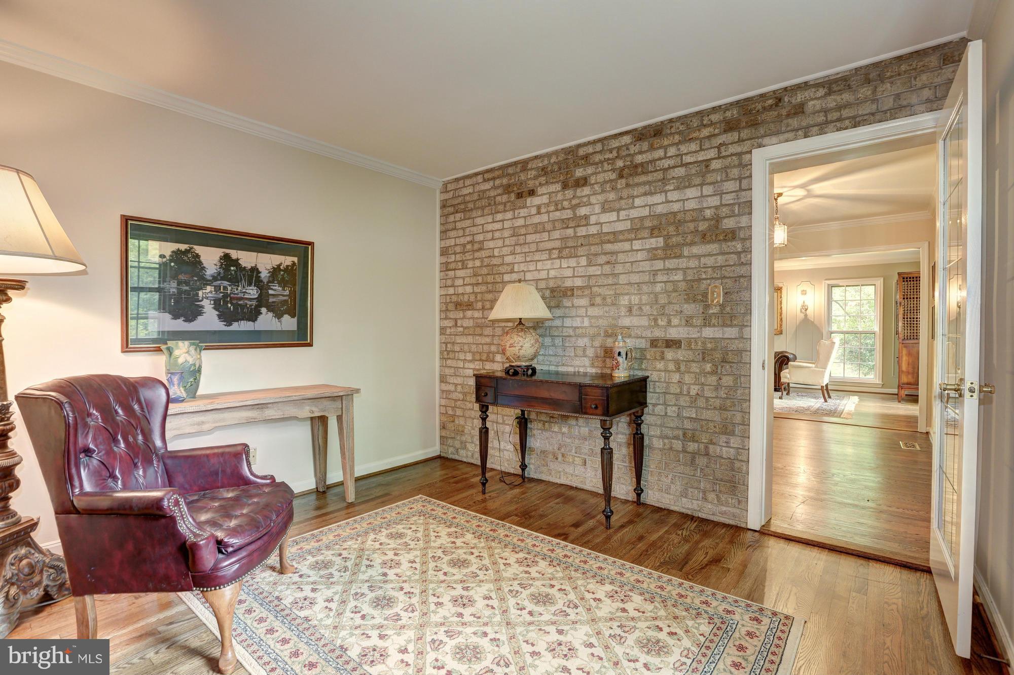 11909 Hunting Ridge Court Potomac, MD 20854 - Photo 4 of 27 Private Study with Exposed Brick