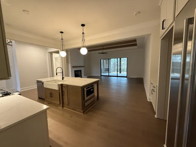 a bathroom with a sink a mirror and a bathtub