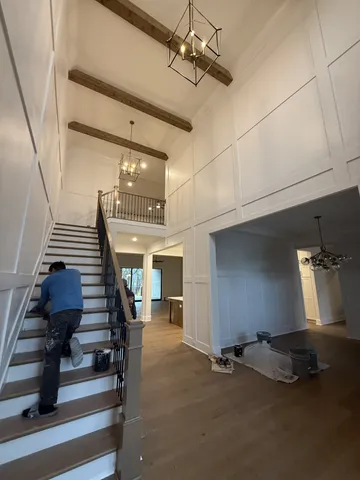 a kitchen with stainless steel appliances white cabinets and a stove