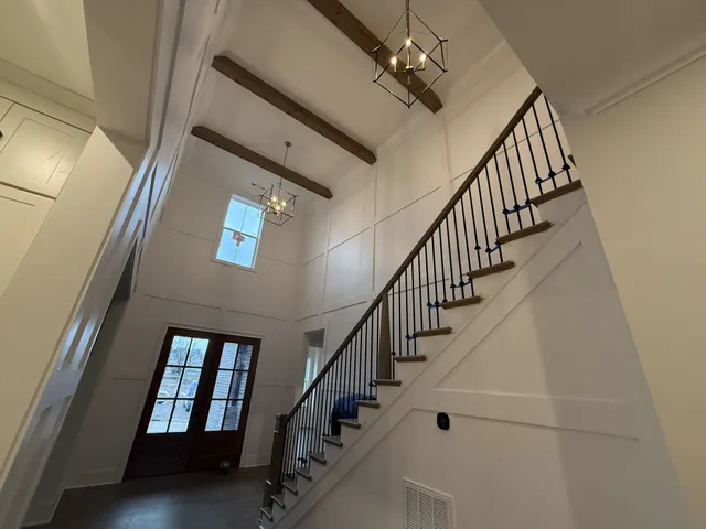 a kitchen with a sink stainless steel appliances and cabinets
