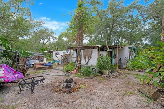 a view of a back yard of the house