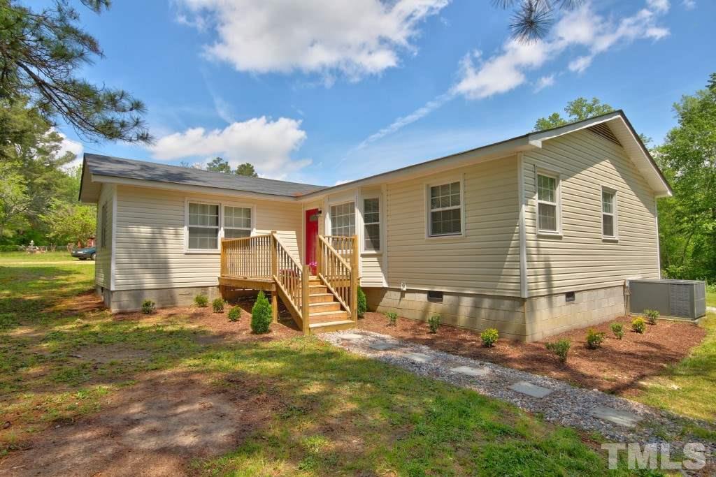 6317 Forestville Road Raleigh, NC 27604 - Photo 1 of 22 Lots of land to enjoy with this charming 3 bedroom home!