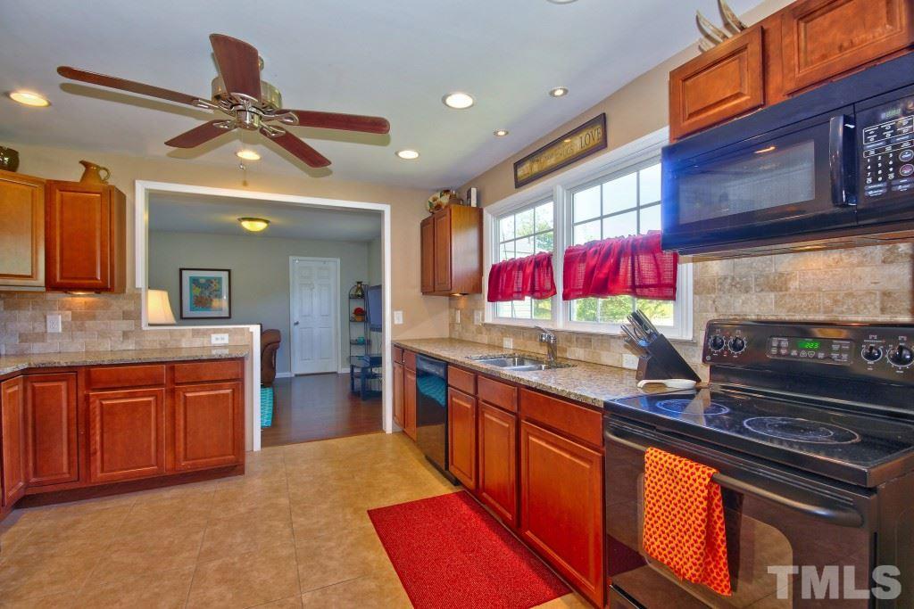 6317 Forestville Road Raleigh, NC 27604 - Photo 8 of 22 Updated kitchen includes granite counter tops and lots of counter space and cabinetry!