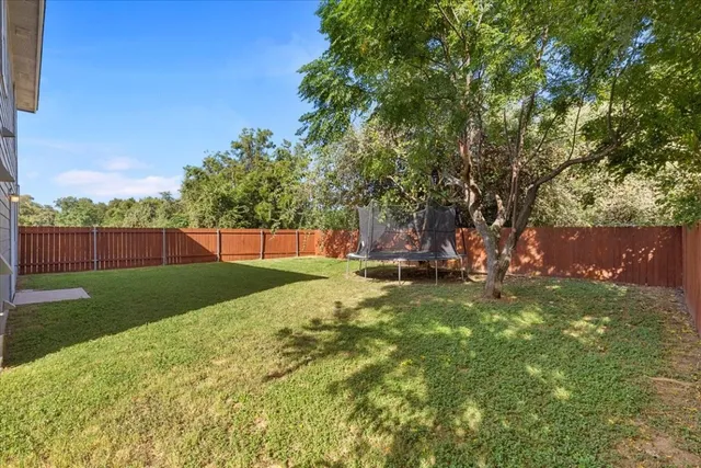 a backyard of a house with seating space