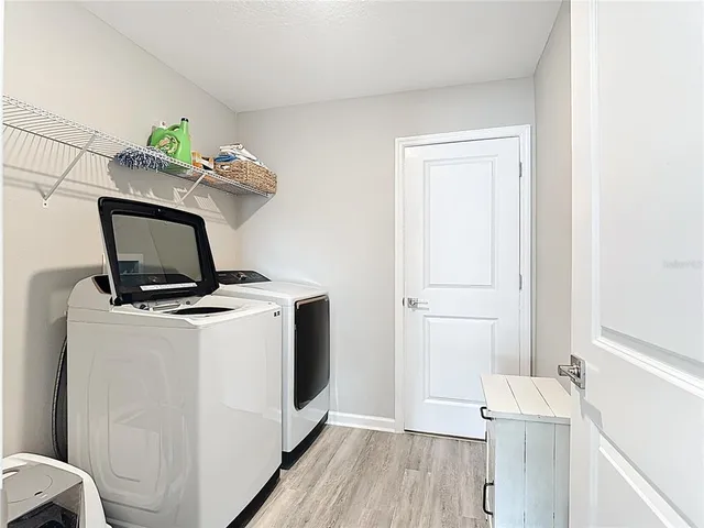 a view of workspace with wooden floor