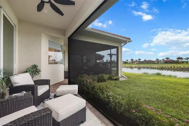 a view of a patio with couches chairs and potted plants