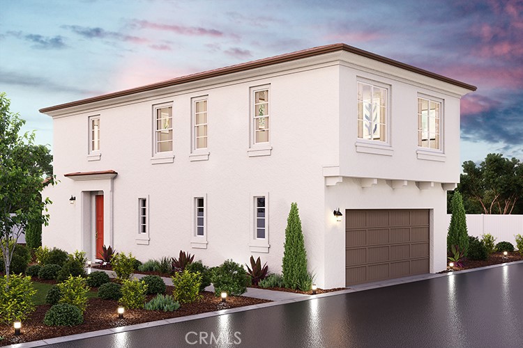 a front view of a house with garage