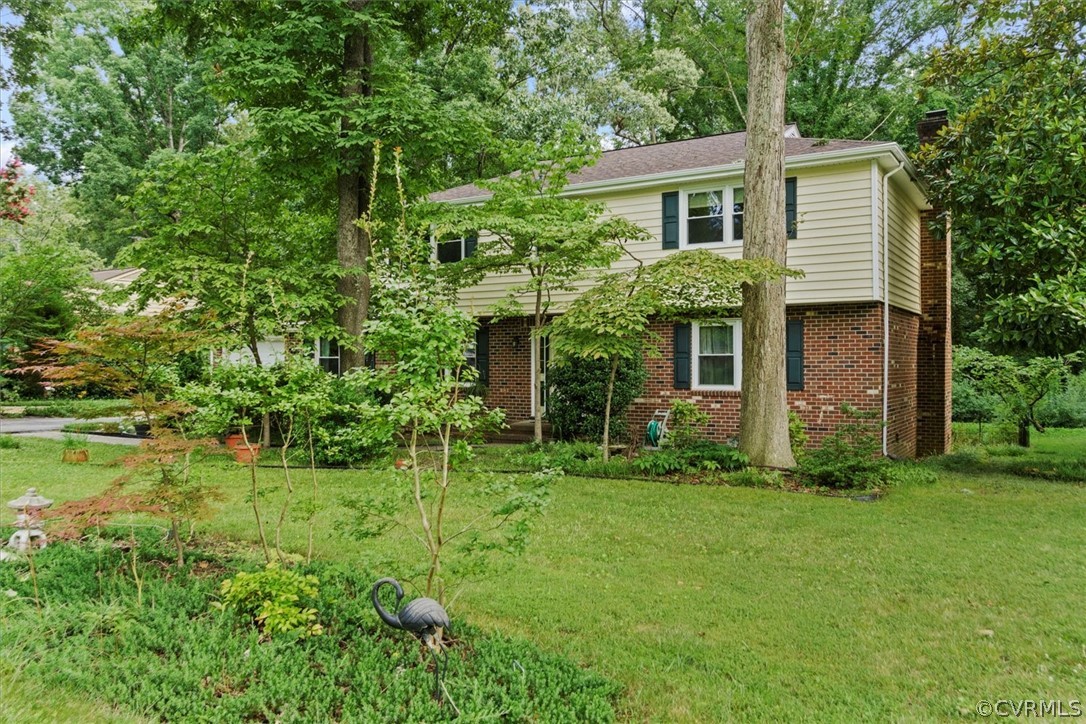 4005 Hidden Valley Road Chester, VA 23831 - Photo 3 of 43 a view of a house with yard and a garden