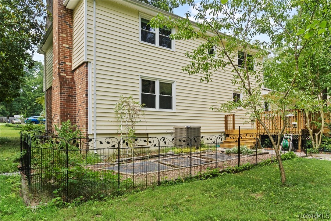4005 Hidden Valley Road Chester, VA 23831 - Photo 35 of 43 a view of a house with a backyard