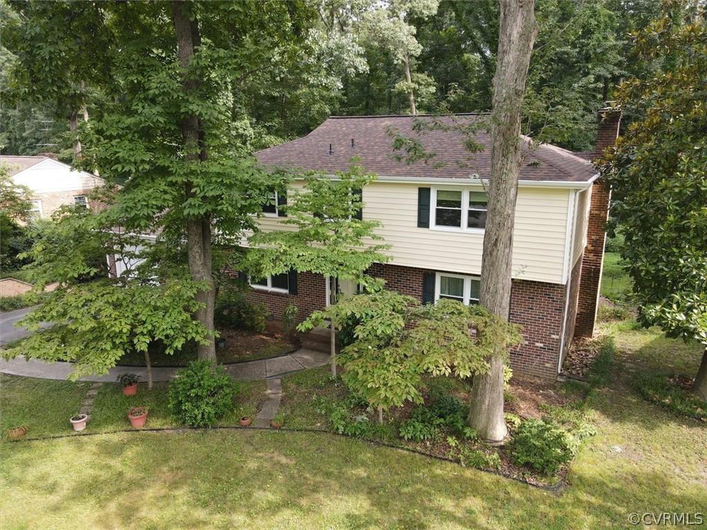 4005 Hidden Valley Road Chester, VA 23831 - Photo 36 of 43 a aerial view of a house with a yard and a large tree