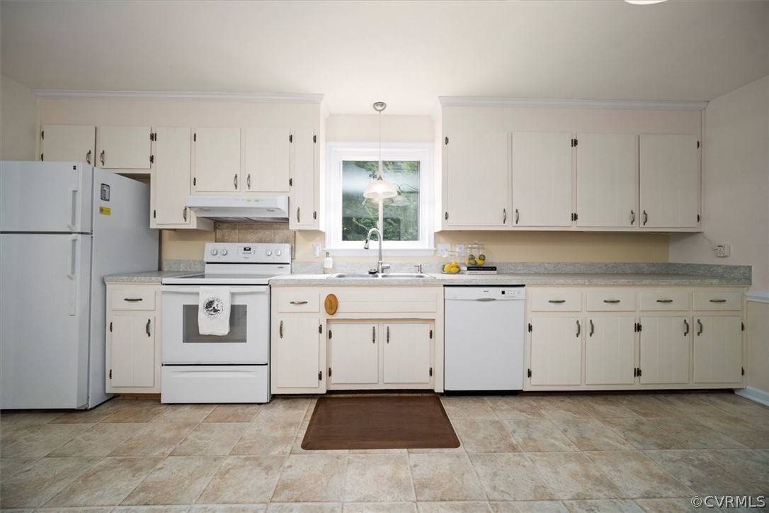 4005 Hidden Valley Road Chester, VA 23831 - Photo 7 of 43 a kitchen with white cabinets and white appliances