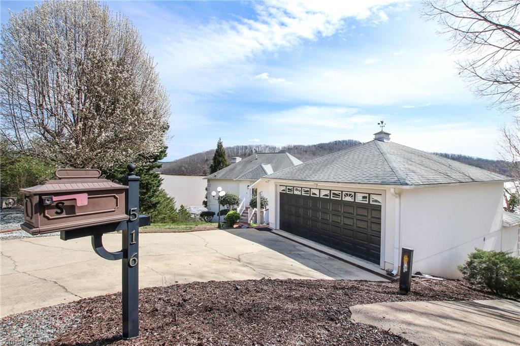 516 Shoreline Road New London, NC 28127 - Photo 6 of 26 Double detached and paved drive to lower lawn