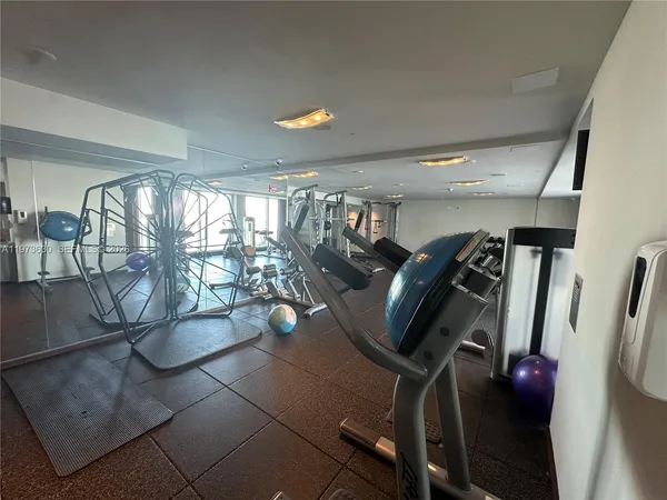 a view of a room with gym equipment