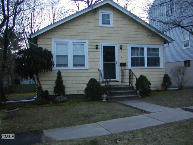 82 Ogden Road Stamford, CT 06905 - Photo 1 of 1 a front view of a house with garden