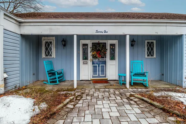 a front view of a house with a porch