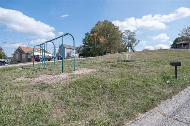 a view of backyard with trampoline