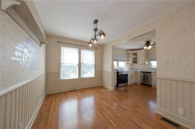 a view of a kitchen and window