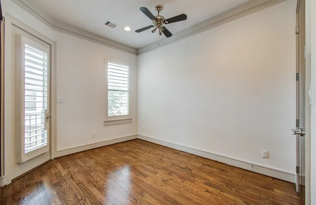 a view of a hallway with front door