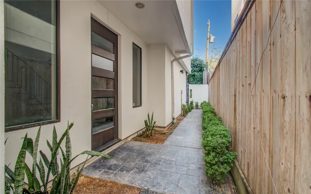a view of entryway with wooden floor and stairs