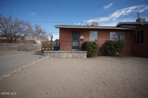 a view of a house with a patio