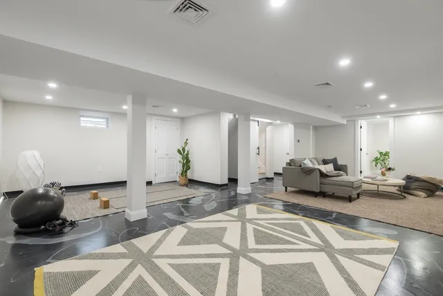 a living room with furniture and a couch
