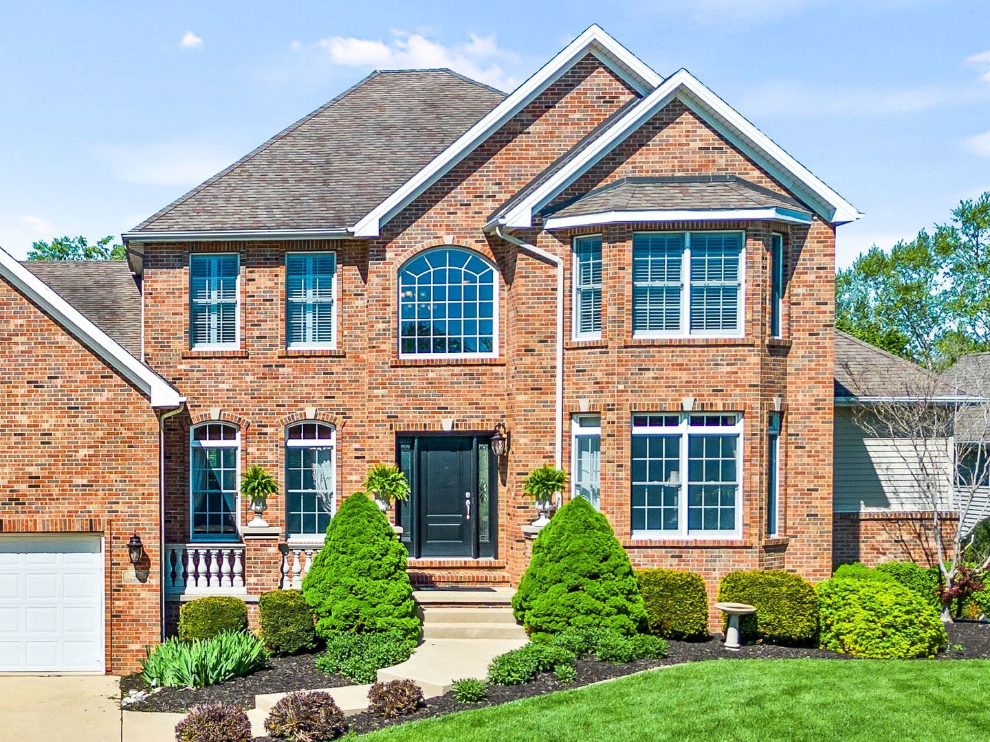 4 Derby Way Bloomington, IL 61704 - Photo 2 of 56 front view of a house with a yard