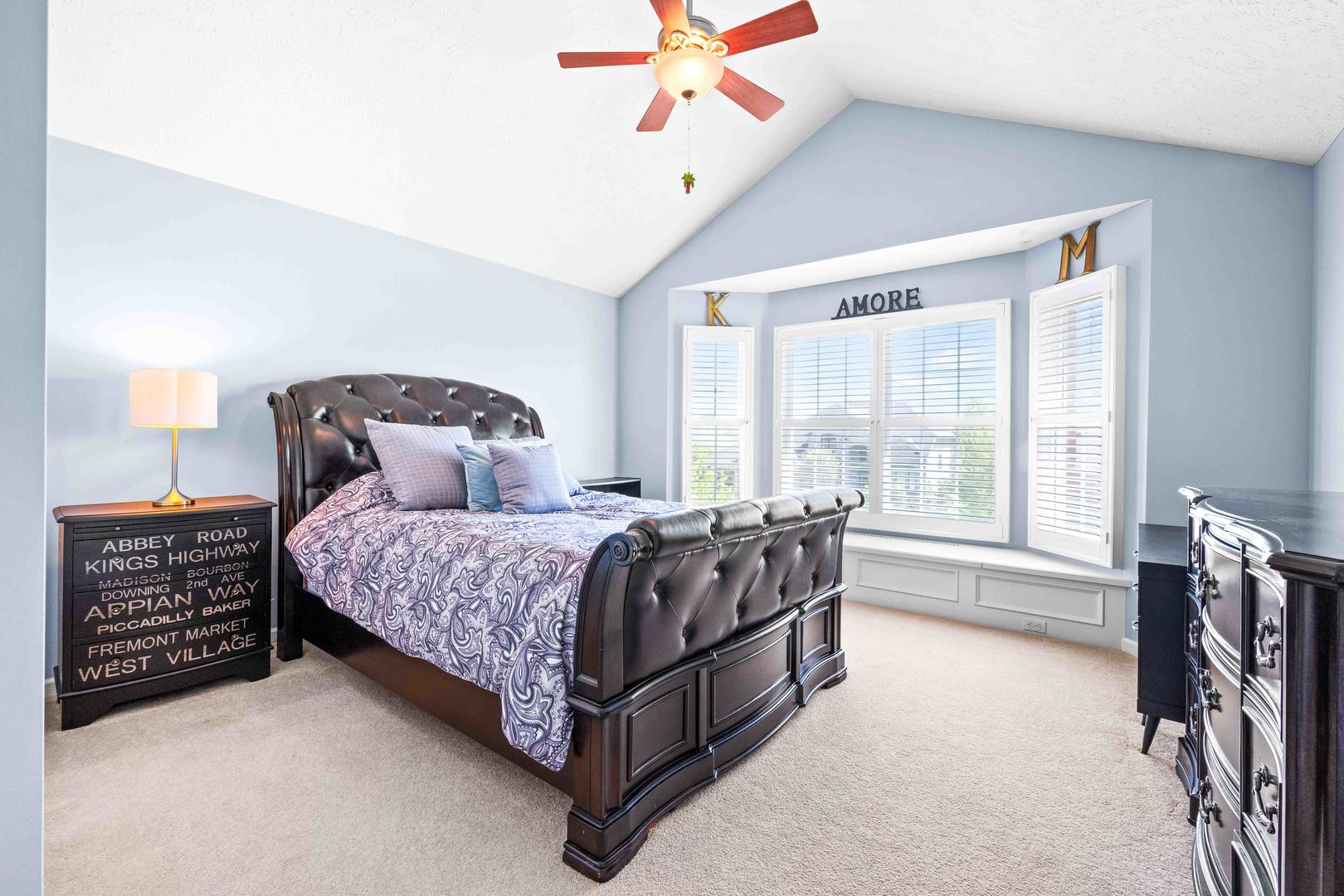 4 Derby Way Bloomington, IL 61704 - Photo 31 of 56 a bedroom with a bed chair and window