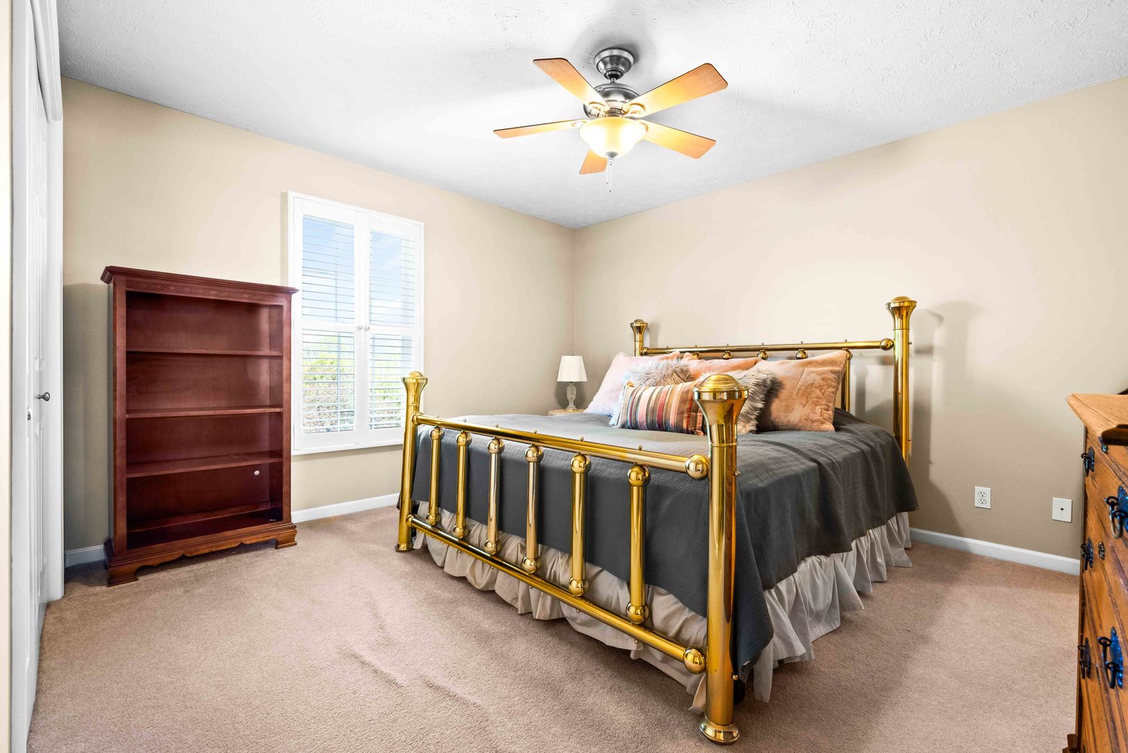 4 Derby Way Bloomington, IL 61704 - Photo 32 of 56 a bedroom with a bed and a ceiling fan