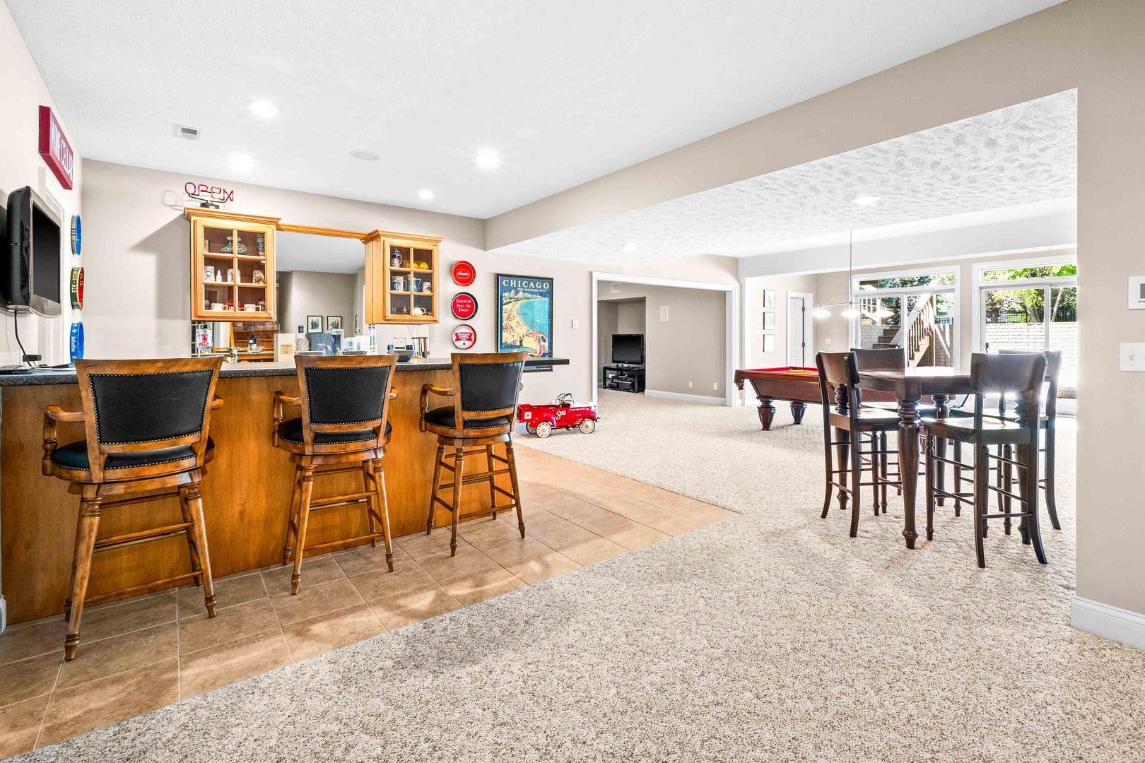 4 Derby Way Bloomington, IL 61704 - Photo 37 of 56 a living room with furniture and a dining table with kitchen view