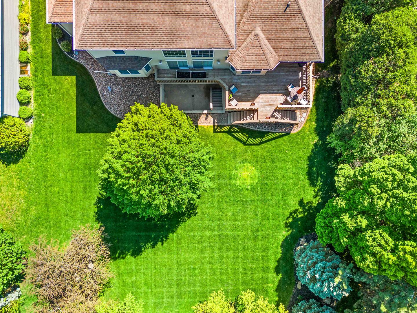 4 Derby Way Bloomington, IL 61704 - Photo 50 of 56 an aerial view of a house with a garden and plants