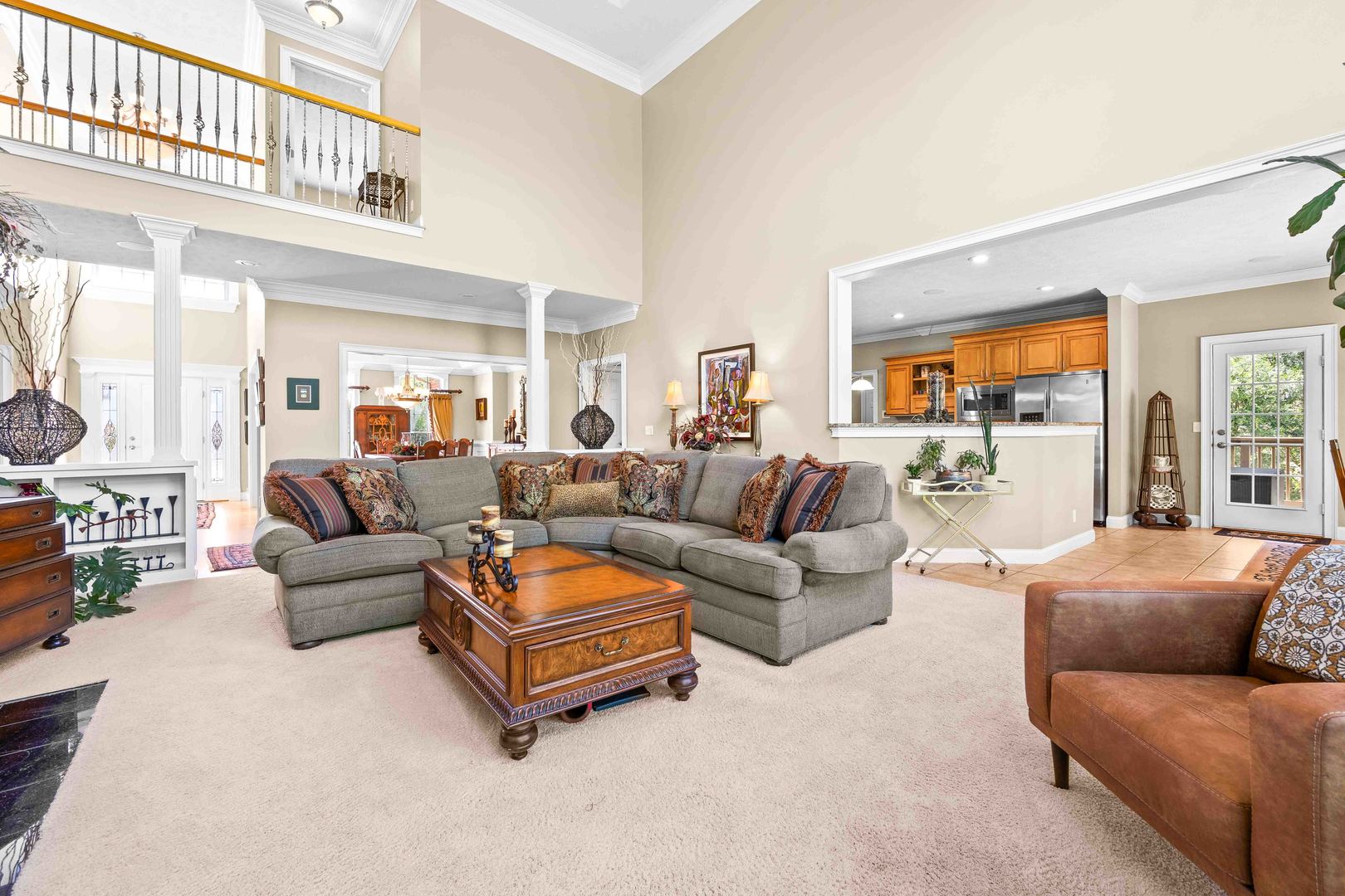 4 Derby Way Bloomington, IL 61704 - Photo 9 of 56 a living room with furniture and a large window