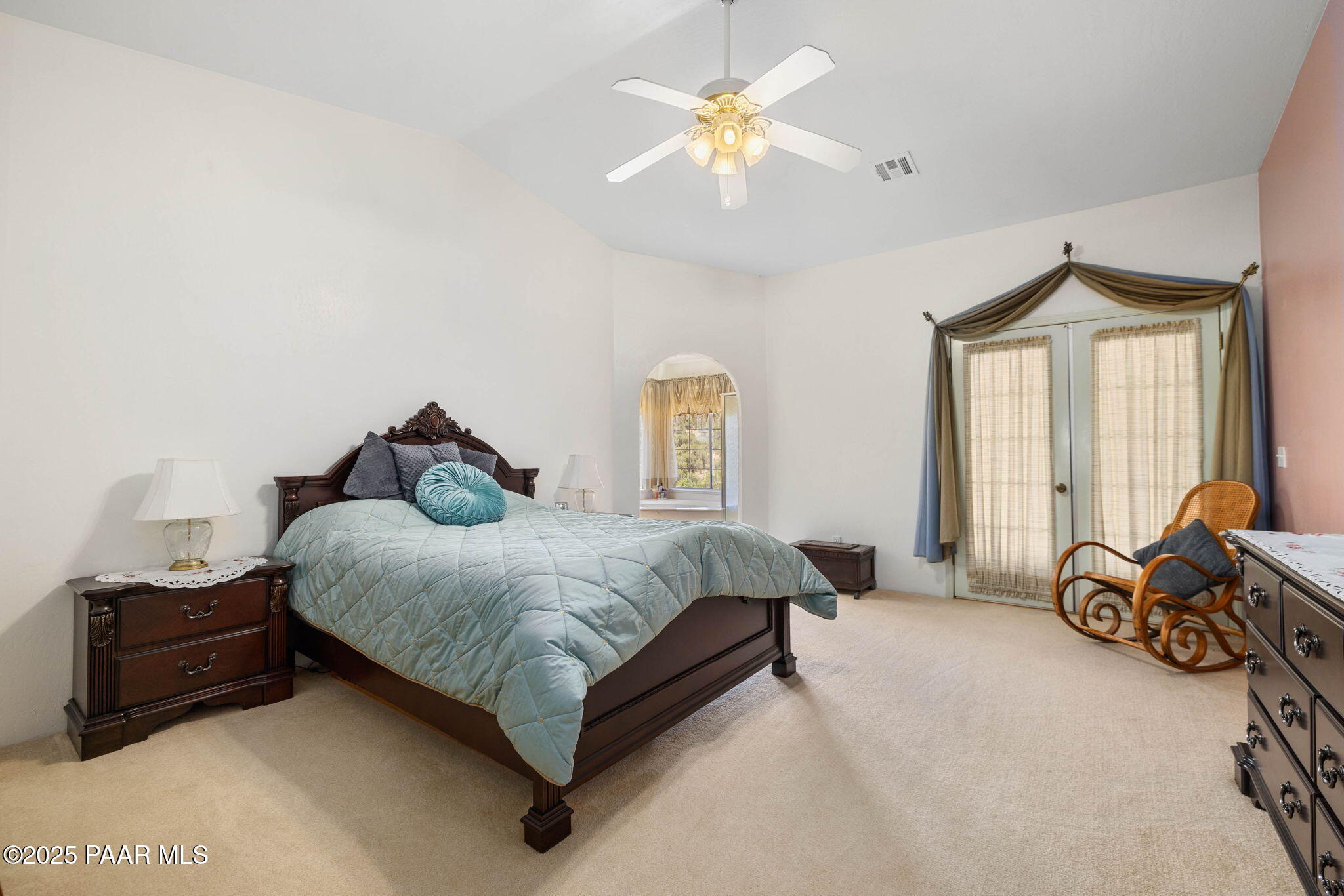 5400 North Skyhawk Road Chino Valley, AZ 86323 - Photo 13 of 26 a spacious bedroom with a bed and a window